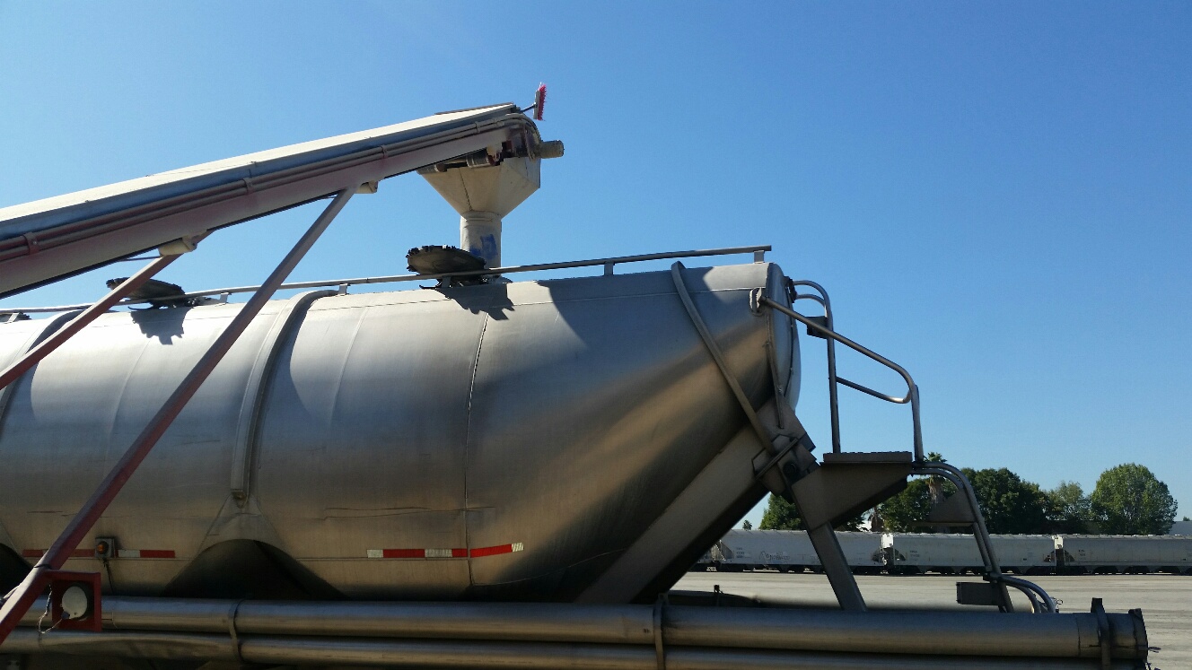 Malt is transferred to from a rail car to a truck