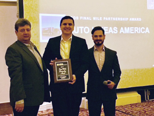 Alejandro Medina and Jose Guzman present Angel Garibay - ALA Intermodal Division Manager (center) with the Final Mile Partnership Award.