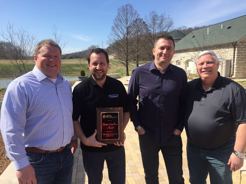 The Dassler Domestic Intermodal leadership team receives the UPDS Service Excellence Award. 