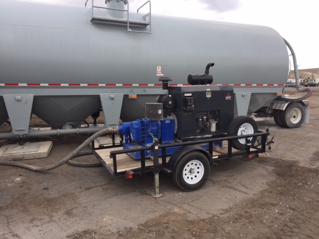 Barite is transferred pneumatically from a storage pig at the Denver Railport.