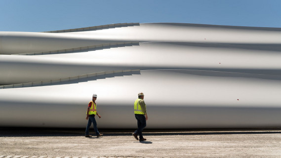  54-meter wind blades waiting for their final delivery to the wind farm.